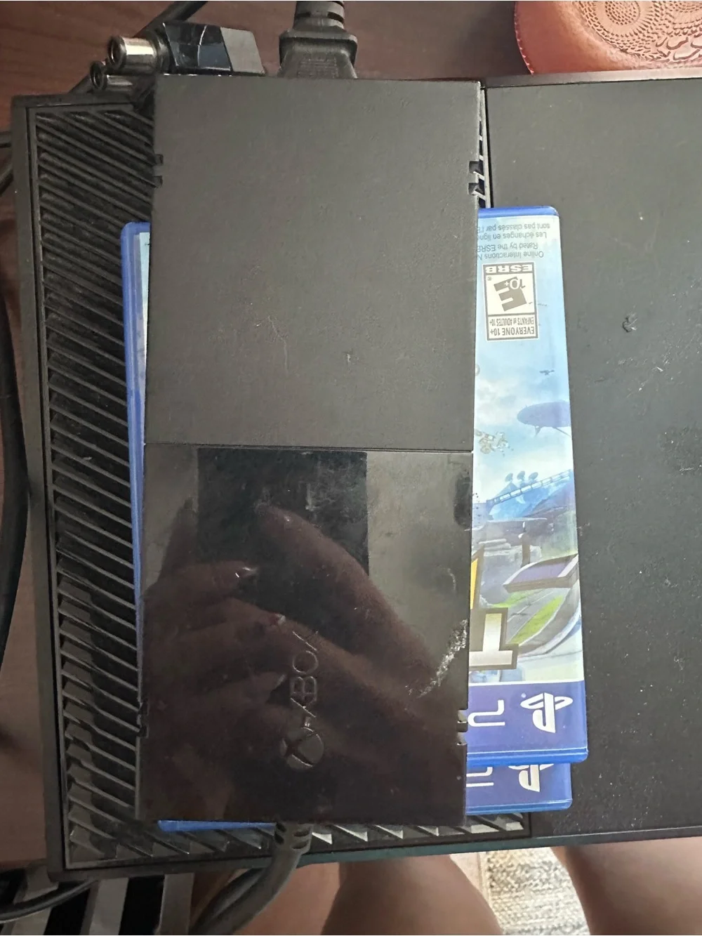 Sony Black Blu-ray Player with gaming controllers and games